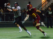 Hockinson receiver Sawyer Racanelli catches a touchdown pass over Prairie&#039;s  Dakota Detter.