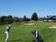 Spencer Tibbits of Fort Vancouver hits an approach shot at No. 18 at Tri-Mountain in the Jeff Hudson Invitational.