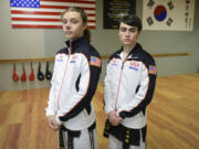 Sixteen-year-old Enzo LaFont, left, and 17-year-old Aiden Bartocci, right, take a break during practice at King Tiger Martial Arts in Vancouver.