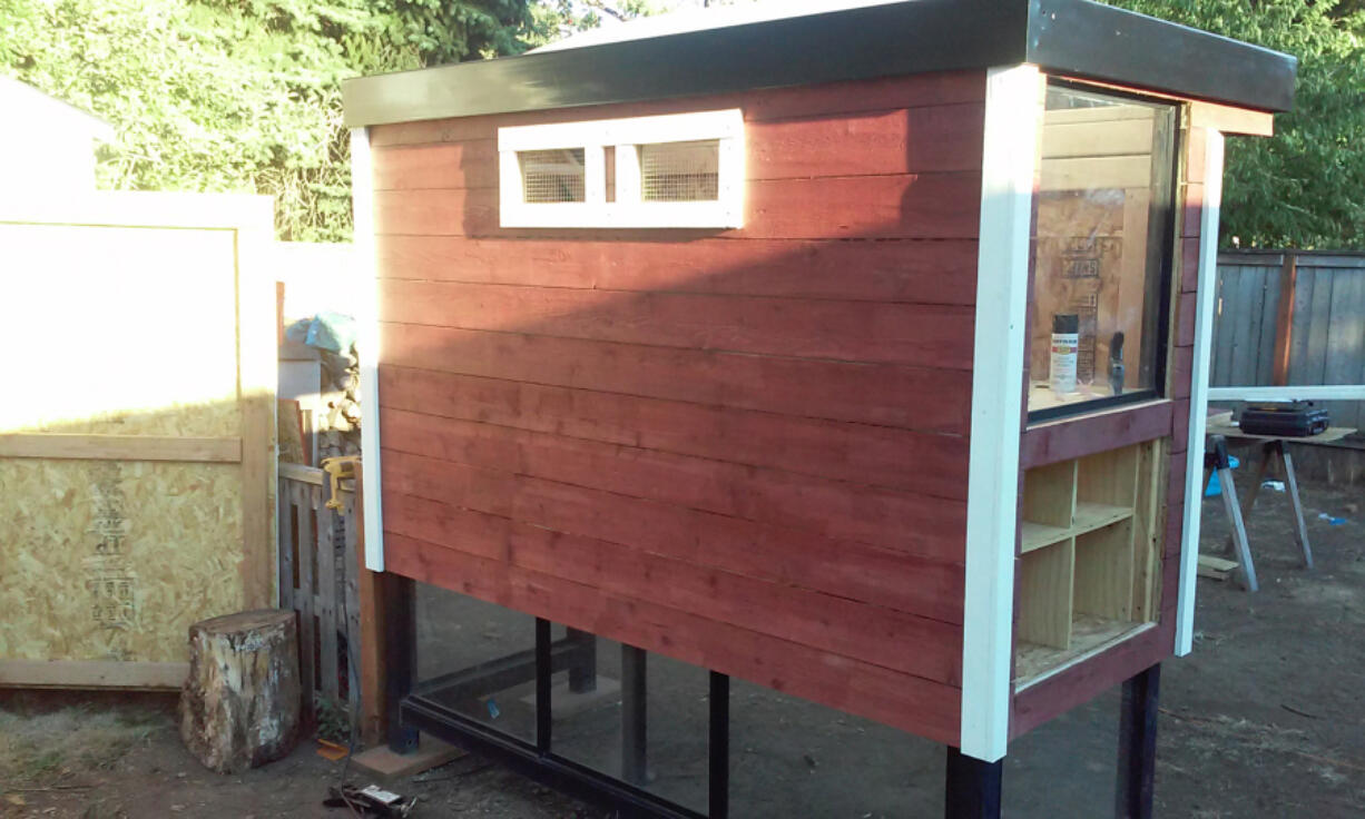 Father Blanchet: Mike Kyle bought an old C-Tran bus stop and repurposed it into a chicken coop.