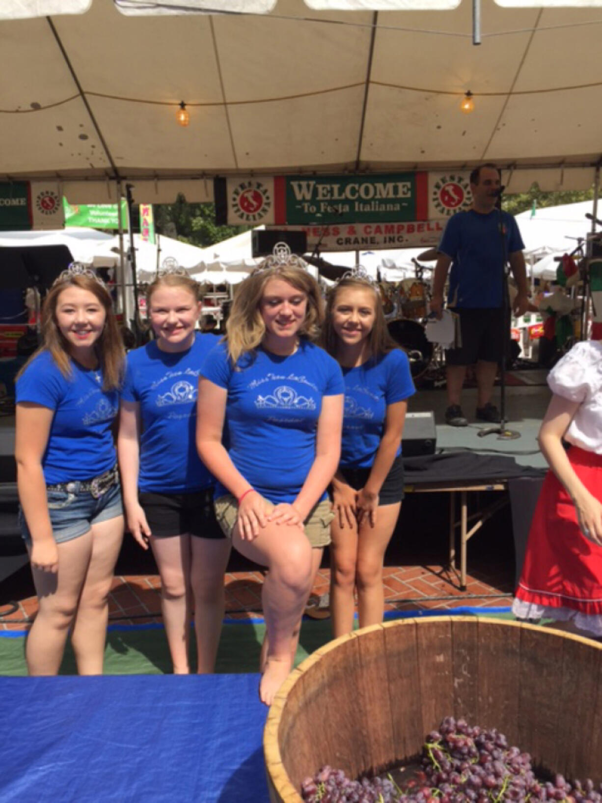 La Center: Miss La Center Court members Dayna Hines, from left, Grace Nolan, Mia Crocker and Emmyleigh Storm at the 25th annual Festa Italiana in Portland, where they stomped grapes and volunteered at a booth.