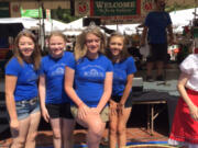 La Center: Miss La Center Court members Dayna Hines, from left, Grace Nolan, Mia Crocker and Emmyleigh Storm at the 25th annual Festa Italiana in Portland, where they stomped grapes and volunteered at a booth.