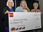 Mt. Vista: Wells Fargo Volunteer Service Award winner Janeen Brooks, center, earned a $1,000 grant for the American Cancer Society through her volunteer work with the organization.