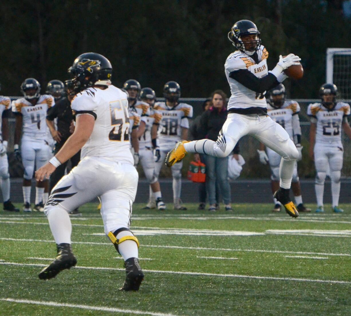 Hudson's Bay wide receiver Myles Artis makes an off balance catch in Woodland on Friday, September 23, 2016. Hudson's Bay beat Woodland 39-24.