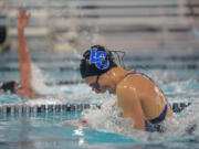 La Center freshman Hailey Grotte swims with the Hockinson swim team at the Clark County Family YMCA in Vancouver on Monday, September 26, 2016. Grotte is the first and only female to swim for La Center High School.