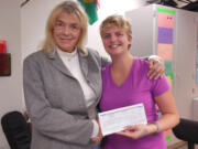 Washougal: Fraternal Order of Eagles representative Karen Ditzler, left, presenting a check to Cape Horn-Skye Elementary School music teacher Anna Breithaupt for $500, which will go to the music program at Cape Horn and Canyon Creek Middle School.