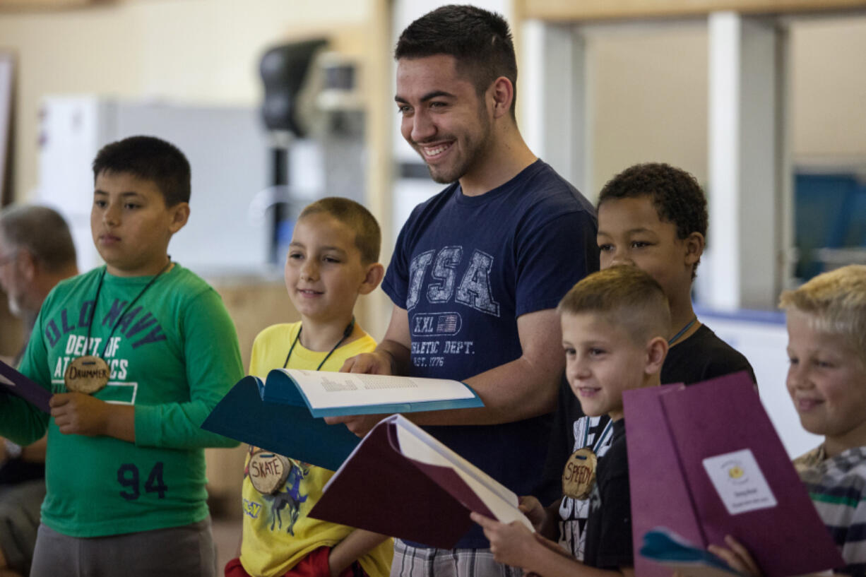 Camas: Union High School senior Ben Stricker, center, was a counselor in August at Merry Heart Children&#039;s Camp for kids who have heart conditions in Sandy, Ore.