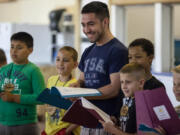 Camas: Union High School senior Ben Stricker, center, was a counselor in August at Merry Heart Children&#039;s Camp for kids who have heart conditions in Sandy, Ore.