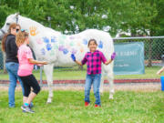 East Vancouver: Students from Evergreen Public Schools meet with Peppa the therapy horse at a Police Activities League summer camp.