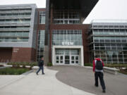 Students make their way into the new STEM Building at Clark College on Friday morning. The ribbon-cutting ceremony is at 3 p.m. Monday.