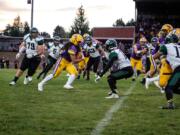 The Columbia River Chieftans move the football up the field against the Evergreen Plainsman Friday night, September 2, 2016.