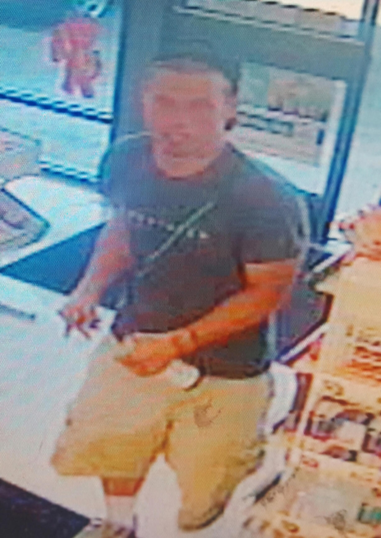 The police are trying to identify this man, who investigators think is connected to a car prowl and credit card fraud case.