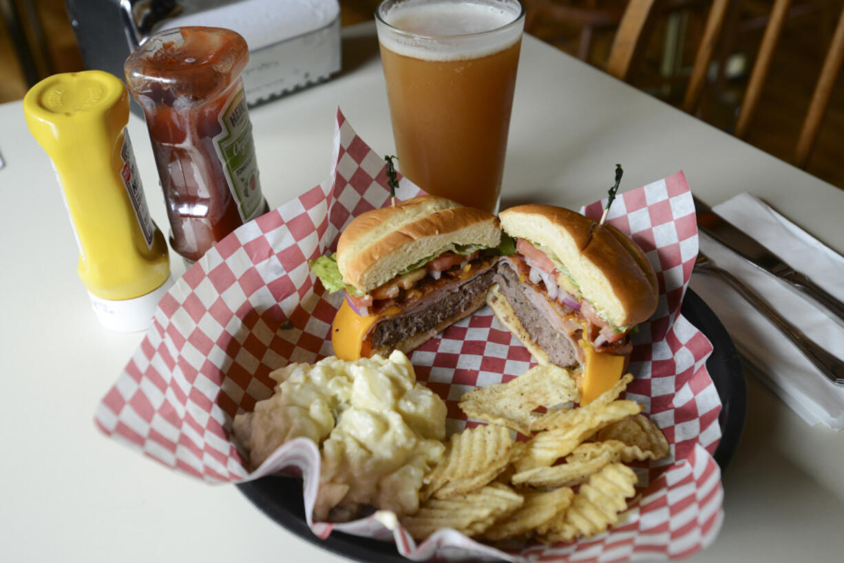 The signature burger at The Rusty Chain in Vancouver, Monday, September 19, 2016.