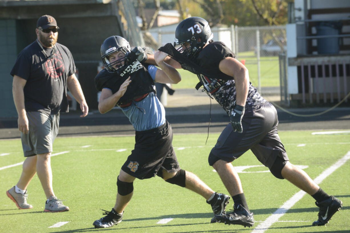 When he&#039;s not hitting opposing defensive linemen, Battle Ground&#039;s Brady Brick (73) likes to hit the history books.