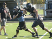 When he&#039;s not hitting opposing defensive linemen, Battle Ground&#039;s Brady Brick (73) likes to hit the history books.