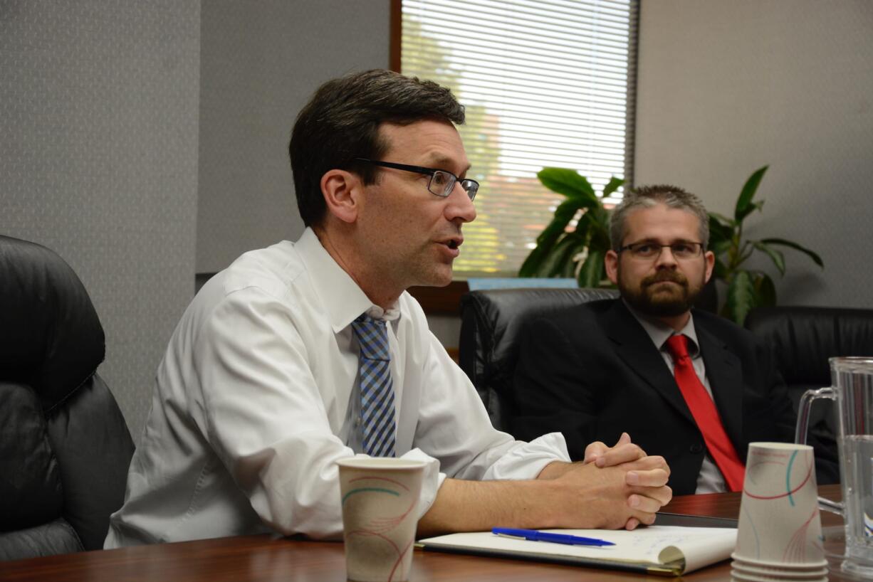 Attorney General Bob Ferguson, a Democrat, and Libertarian challenger Joshua Trumbull talk Monday, Sept. 26, 2016 with The Columbian editorial board.