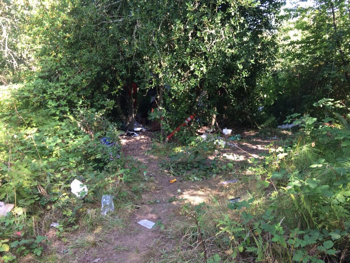 A passer-by found a dead body Thursday afternoon in this wooded area in Hazel Dell, and detectives with the Clark County Sheriff's Office were investigating. Additional identifying information wasn't available, and the sheriff's office said it wasn't immediately obvious what caused the person's death.