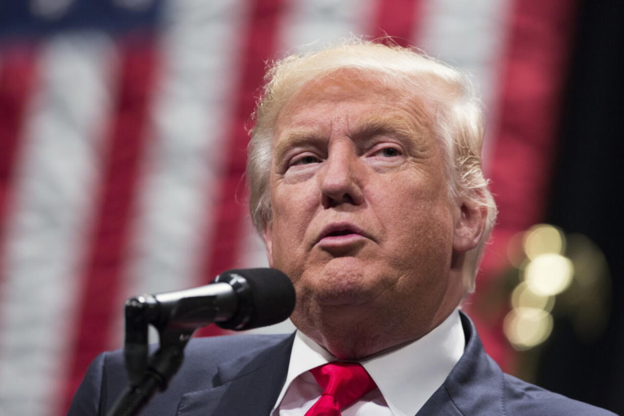 Republican presidential candidate Donald Trump speaks Wednesday during a campaign rally in Toledo, Ohio. In the final sprint to Election Day, Donald Trump faces a daunting series of roadblocks in the minds of Americans as he tries to catch up to Hillary Clinton.