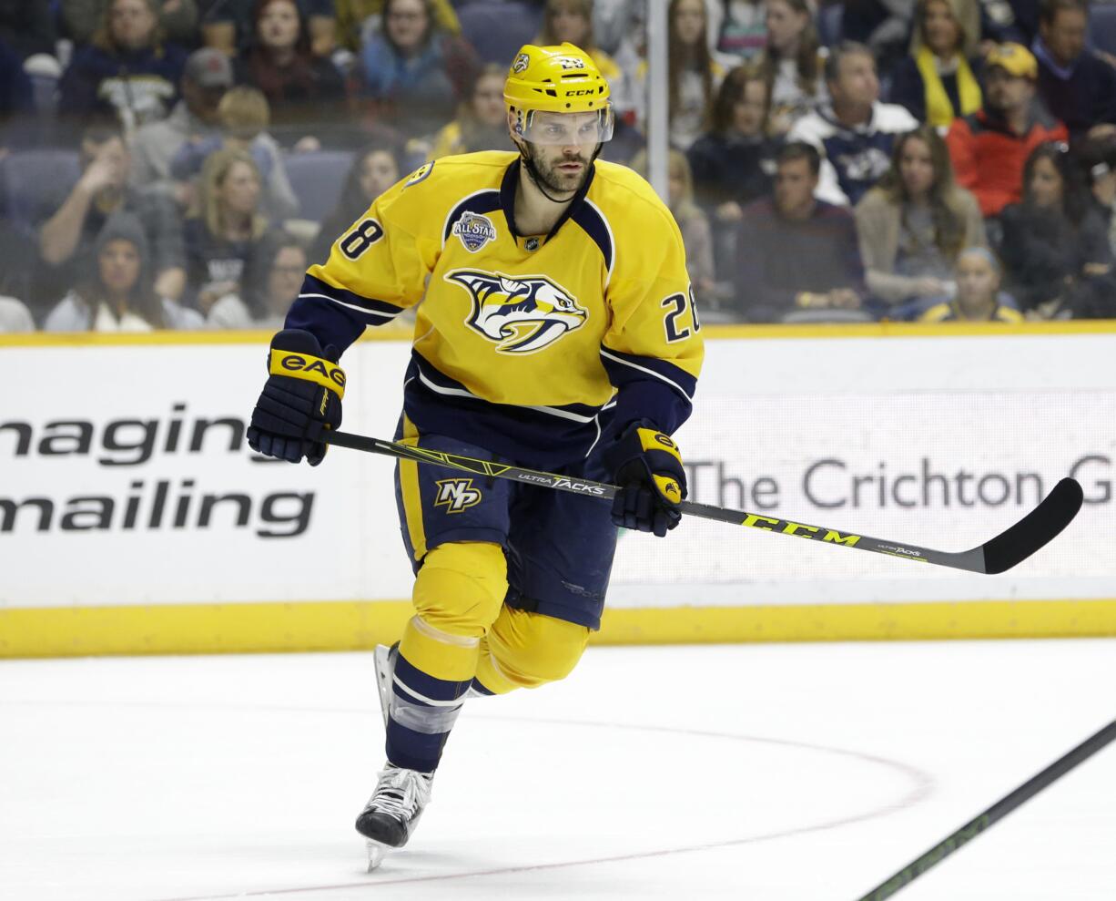 Nashville Predators center Paul Gaustad is retiring at the age of 34. Gaustad announced his retirement Thursday, Sept. 8, 2016, through his Instagram account.