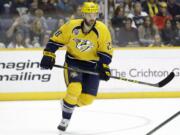 Nashville Predators center Paul Gaustad is retiring at the age of 34. Gaustad announced his retirement Thursday, Sept. 8, 2016, through his Instagram account.