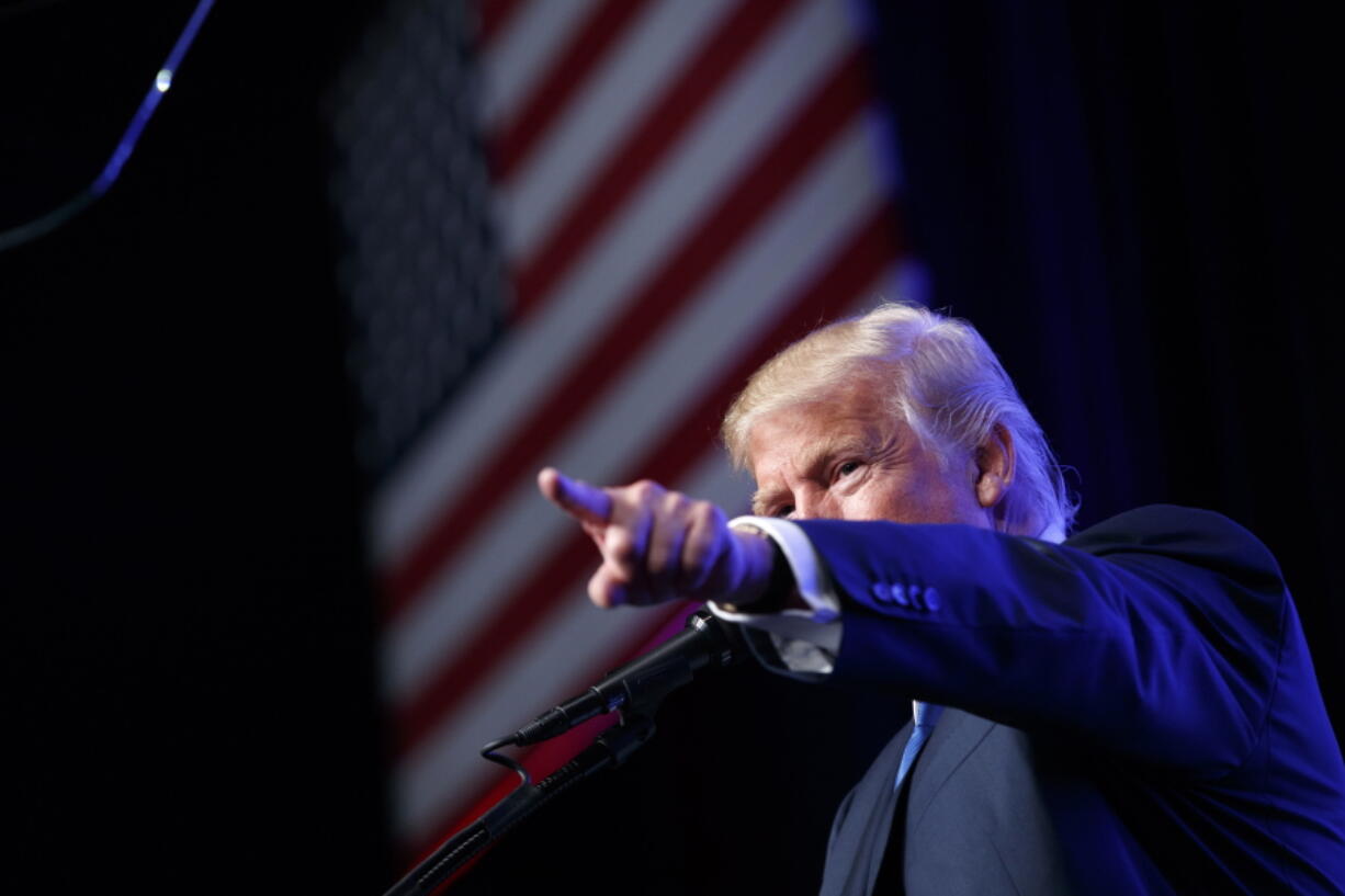 Republican presidential candidate Donald Trump speaks during a campaign rally at the James L. Knight Center in Miami.