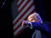 Republican presidential candidate Donald Trump speaks during a campaign rally at the James L. Knight Center in Miami.