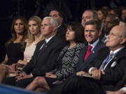 Republican vice presidential candidate Indiana Gov. Mike Pence, center left, waits for the start of the first presidential between Republican presidential candidate Donald Trump and Democratic presidential candidate Hillary Clinton at Hofstra University in Hempstead, N.Y., on Monday.