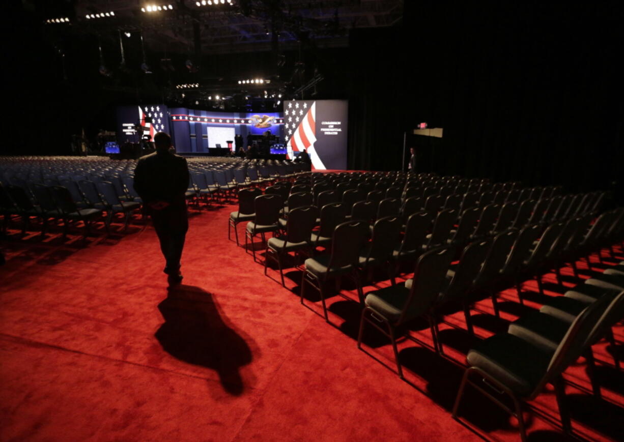 A security official stands in the hall the presidential debate between Democratic presidential candidate Hillary Clinton and Republican presidential candidate Donald Trump at Hofstra University in Hempstead, N.Y., on Monday.