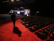 A security official stands in the hall the presidential debate between Democratic presidential candidate Hillary Clinton and Republican presidential candidate Donald Trump at Hofstra University in Hempstead, N.Y., on Monday.