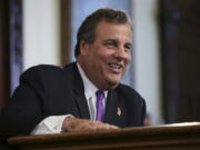 FILE- In this Thursday, Dec. 22, 2011 file photograph, New Jersey Gov. Chris Christie, right, and Jeff Chiesa, listen to Christie&#039;s Chief of Staff Richard Bagger at the Statehouse in Trenton, N.J. Despite being passed over for the job of Trump&#039;s running mate, New Jersey Gov. Chris Christie and an entourage of his closest allies could leave a lasting mark on a Trump administration, should he win in November. As chairman of Trump&#039;s transition team, Christie is building a coalition of advisers who will staff key federal government agencies and execute new policy prescriptions if Trump wins the general election. Among them, are two of his longtime aides, Bagger, a lobbyist who helped lead Christie&#039;s gubernatorial transition team and Bill Palatucci, a top Christie adviser whose law firm has been showered with government legal work.