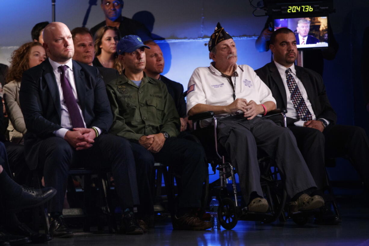 Veterans listen as Republican presidential candidate Donald Trump speaks during the Commander in Chief Forum hosted by NBC, Wednesday, Sept. 7, 2016, in New York.