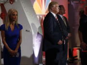 Republican presidential candidate Donald Trump waits with his campaign manager Kellyanne Conway, left, waits to be introduced during the Commander in Chief Forum hosted by NBC on Wednesday in New York.