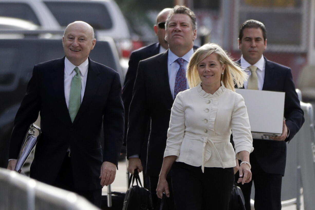 New Jersey Gov. Chris Christie&#039;s former Deputy Chief of Staff Bridget Anne Kelly, front right, arrives at Martin Luther King, Jr., Federal Court for a hearing on Tuesday in Newark, N.J. Three years after gridlock paralyzed a New Jersey town next to the George Washington Bridge for days, two former allies of Christie, Bill Baroni and Kelly, are being tried.