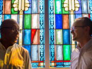 The Rev. James W. Goolsby, Jr., senior pastor of the First Baptist Church, left, and the Rev. Scott Dickison, senior pastor of First Baptist Church of Christ talk in July at Dickison&#039;s church in Macon, Ga. There are two First Baptist Churches in Macon: one black and one white. Two years ago, Dickison and Goolsby met to try to find a way the congregations, neighbors for so long, could become friends. They would try to bridge the stubborn divide of race.