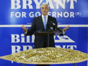 Washington state gubernatorial candidate Bill Bryant, a Republican running against Washington Gov. Jay Inslee, a Democrat, talks to reporters at a press conference, Wednesday in Seattle in front of a table that he said displayed 25,000 key blanks, to represent the number of master keys that corrections officials discovered were missing from Western State Hospital during a security review in response to the escape of two violent patients. Bryant called on Inslee to release reports on staffing and other problems at the state&#039;s largest psychiatric hospital. (AP Photo/Ted S.