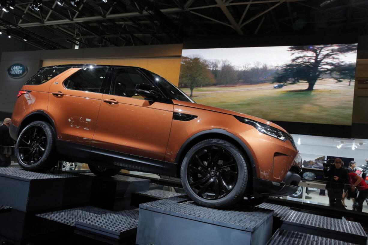 The new Land Rover Dicovery is on display Friday at the Paris Auto Show. The first complete redesign of the Discovery in 12 years, this family oriented large SUV has room for seven adults in three rows.