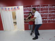 First-term Republican Rep. Will Hurd, right, of Texas, poses for a photo with a supporter at a campaign office, in San Antonio. Many House Republican incumbents worry that blowback from Republican presidential nominee Donald Trump&#039;s anti-Hispanic rhetoric and promises to build a towering wall the length of the U.S.-Mexico border could hurt their re-election chances, a problem especially acute for those in heavily Latino districts like that of Hurd, whose territory encompasses 820 miles of the U.S.-Mexico border.