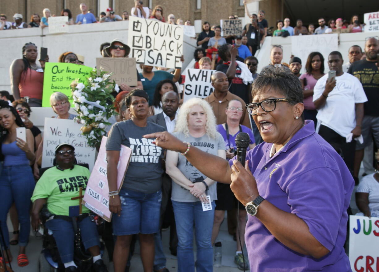 Pastor Jennettie Marshall, of Living Sanctuary Evangelistic Ministries, speaks at a &quot;protest for justice&quot; over Friday&#039;s shooting death of Terence Crutcher, sponsored by We the People Oklahoma, in Tulsa, Okla., on Tuesday.