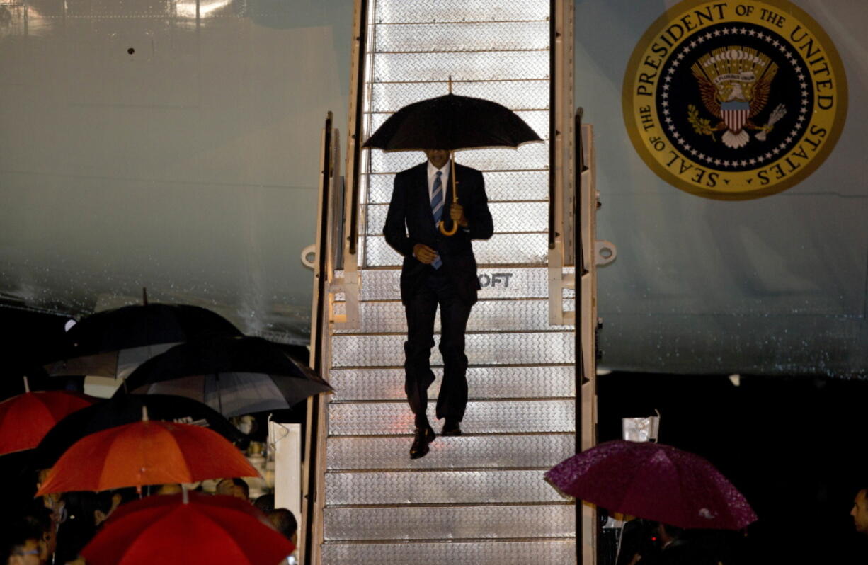 President Barack Obama on Monday walks down the steps from Air Force One upon his arrival at Wattay International Airport in Vientiane, Laos. Obama will be meeting the leaders of the Association of Southern Asian Nations at a summit aimed at strengthening the U.S.-ASEAN strategic partnership.