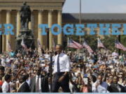 President Barack Obama arrives Tuesday at a campaign event for Democratic presidential candidate Hillary Clinton at Eakins Oval in Philadelphia.