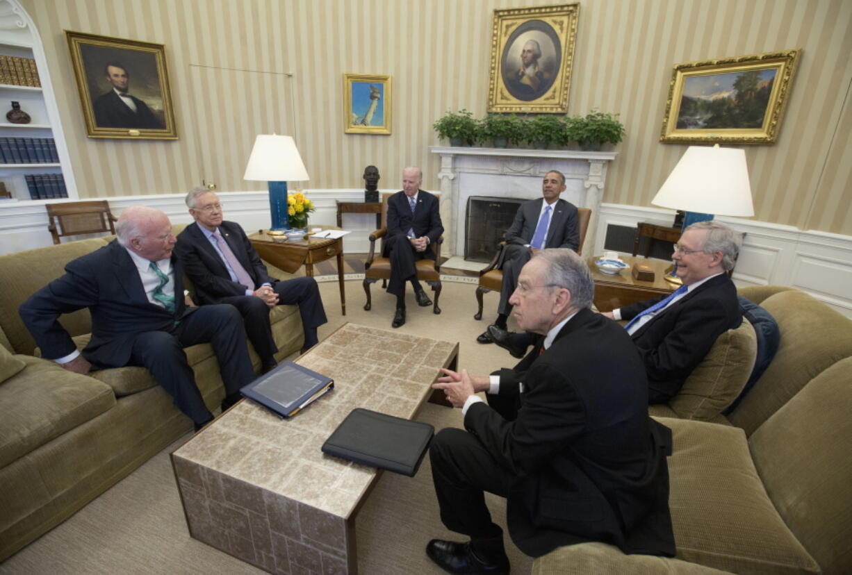 President Barack Obama meets with, from left, the Senate Judiciary Committee&#039;s ranking member Sen. Patrick Leahy, D-Vt., Senate Minority Leader Sen. Harry Reid of Nev., Vice President Joe Biden, Senate Majority Leader Mitch McConnell of Ky., and Senate Judiciary Committee Chairman Sen. Chuck Grassley, R-Iowa, in the Oval Office of the White House in Washington on March 1, 2016 file photo. Budget and trade top the agenda as President Barack Obama meets with the top Republicans and Democrats in Congress on Monday. The president is intent on ending his presidency with a win on trade, but leaders say it&#039;s not happening now or in a lame-duck session.