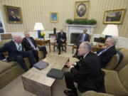 President Barack Obama meets with, from left, the Senate Judiciary Committee&#039;s ranking member Sen. Patrick Leahy, D-Vt., Senate Minority Leader Sen. Harry Reid of Nev., Vice President Joe Biden, Senate Majority Leader Mitch McConnell of Ky., and Senate Judiciary Committee Chairman Sen. Chuck Grassley, R-Iowa, in the Oval Office of the White House in Washington on March 1, 2016 file photo. Budget and trade top the agenda as President Barack Obama meets with the top Republicans and Democrats in Congress on Monday. The president is intent on ending his presidency with a win on trade, but leaders say it&#039;s not happening now or in a lame-duck session.