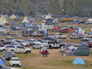 The Sacred Stones Overflow Camp is growing in size and number as more people arrive at the site along North Dakota Highway 1806 and across the Cannonball River from the Standing Rock Sioux Indian Reservation on Monday in Morton County, N.D.