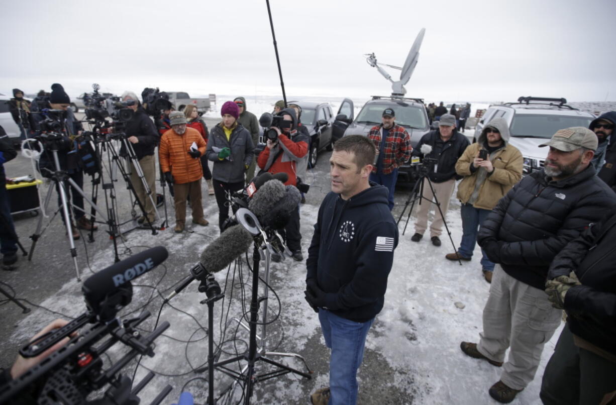 Brandon Curtiss of the &#039;Idaho 3%&#039; group speaks to the media after arriving at the Malheur National Wildlife Refuge near Burns, Ore., on Jan. 9, 2016.