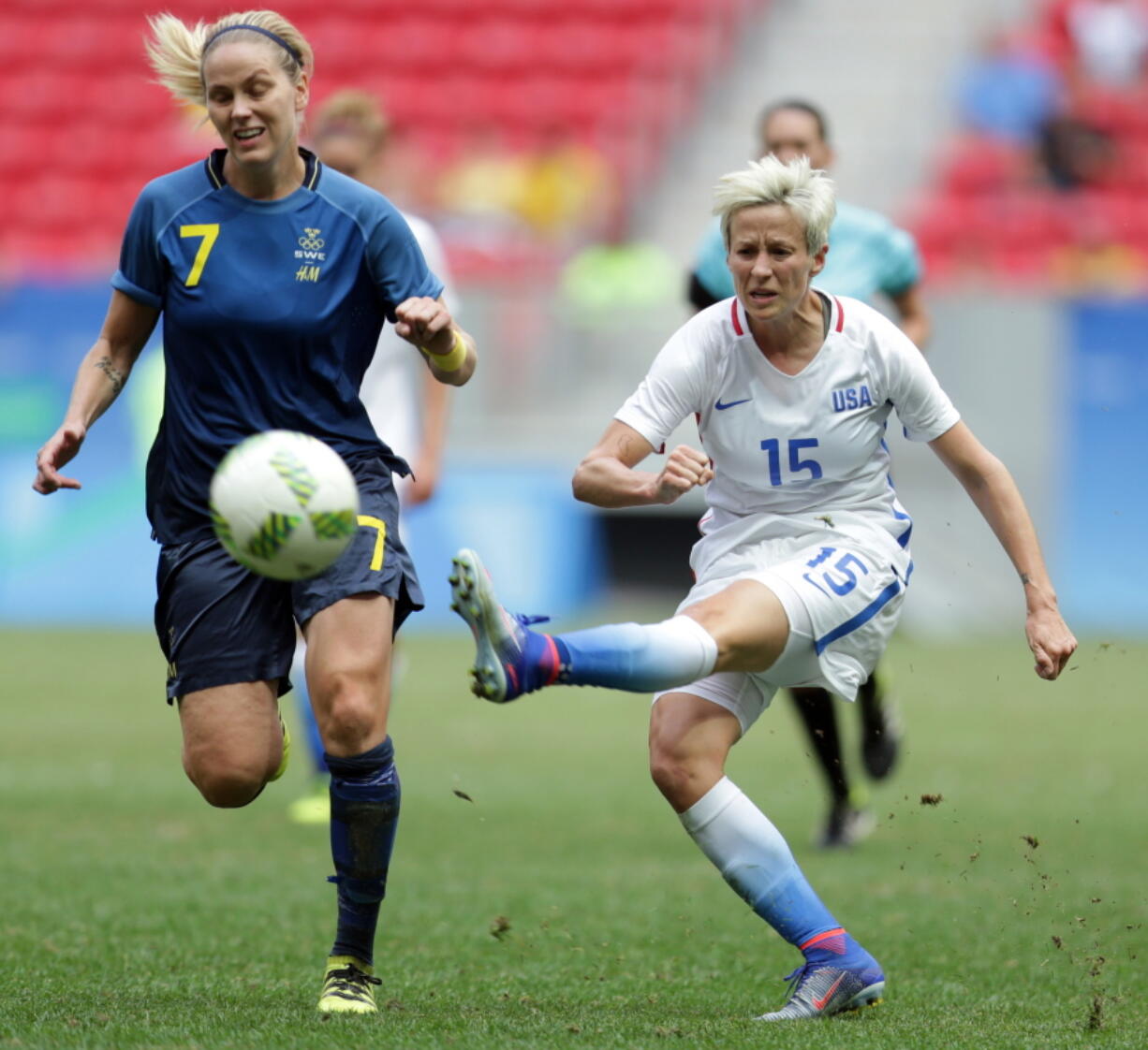 United States&#039; Megan Rapinoe kicks the ball past Sweden&#039;s Lisa Dahlkvist during a quarterfinal match of the women&#039;s Olympic football tournament in Brasilia on Aug. 12.