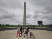 Visitors walks past the Washington Monument on the National Mall in Washington, Monday, Sept. 26, 2016. Elevator trouble closes Washington Monument indefinitely the National Park Service says the Washington Monument will be closed indefinitely because of ongoing problems with its elevator. The park service said in a statement Monday that the monument will remain closed until its elevator control system can be modernized. The lone elevator that takes visitors to the top of the 555-foot obelisk has broken down frequently over the past two years.