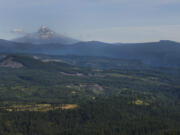 Mount Hood is seen from the Yacolt Burn State Forest, Thursday September 8, 2016. In 1902, dozens of fires spread across 239,000 acres in Clark, Cowlitz and Skamania counties. Since then, the forest has experienced regrowth, recreation opportunities and logging.