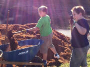 Battle Ground: Volunteers participating in Clark County Connect&#039;s fifth annual Day of Service in Battle Ground on Sept.