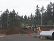 Construction crews take the first steps in building a new regional maintenance facility a the Bonneville Power Administration Ross Complex just off Northeast Minnehaha Street near Northeast 10th Avenue on Tuesday.