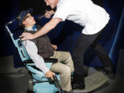 Caleb Bourgeois as meek Seymour, left, and Thomas Zalutko as sadistic Orin in &quot;Little Shop of Horrors.&quot; (Magenta Theater)